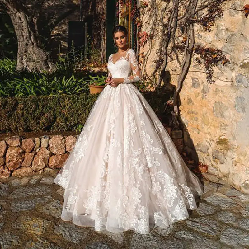 

Luxury Champagne A Line Wedding Dresses V neck Lace Appliques Illusion Long Sleeves Women Wedding Dress Plus Size Bridal Gown