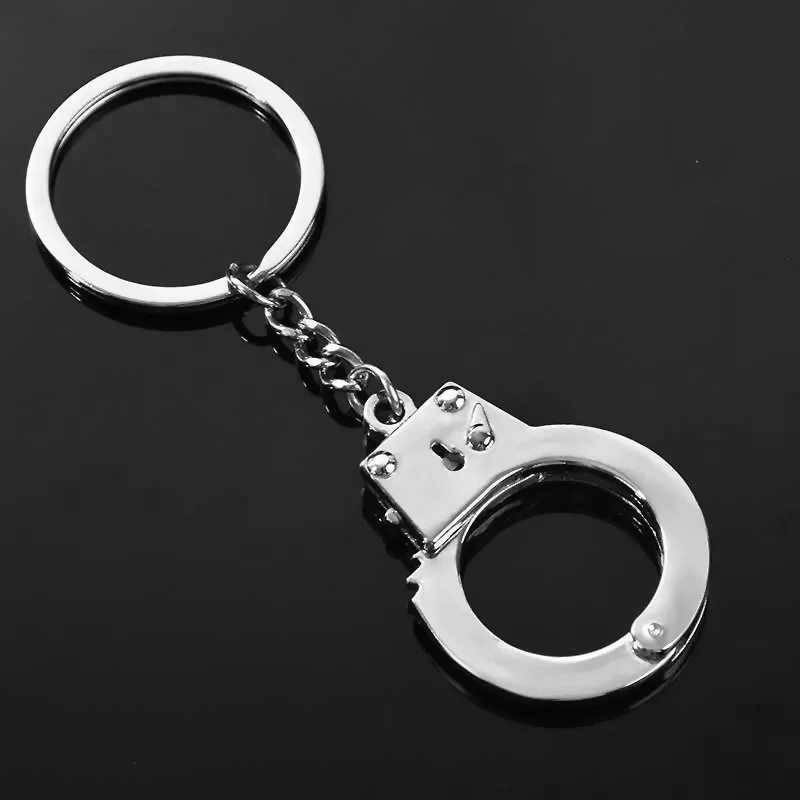 

Персонализированный мини-брелок из цинкового сплава высокого качества с искусственными наручниками, декоративный органайзер для автомоби...