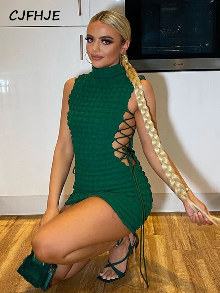 

CJFHJE Solid 3D Sleeveless Turtleneck Hollow Out Bandage Mini Dress Slim 2022 Summer Women Outfits Streetwear Party Club Y2K