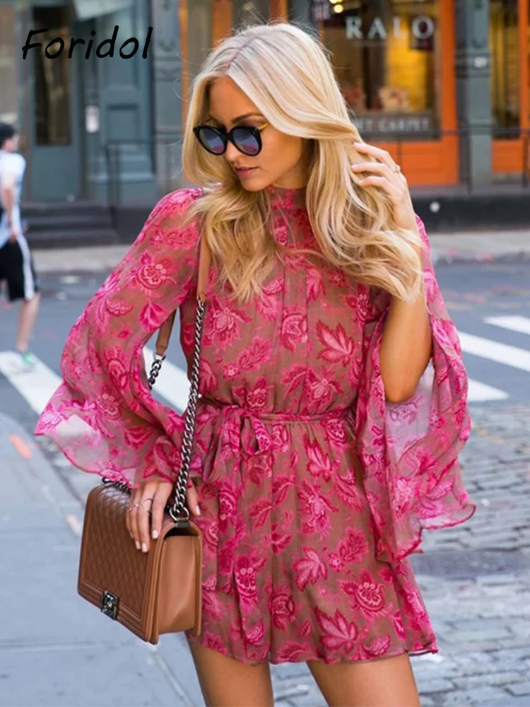 

Foridol Backless Floral Print Boho Pink Romper Playsuit Women Wide Leg Beach Pink Loose Romper Stand Collar Flare Sleeve Overall