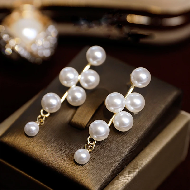 

New layered pendant pearl elegant high sense earrings female net red earrings Japanese and Korean earrings