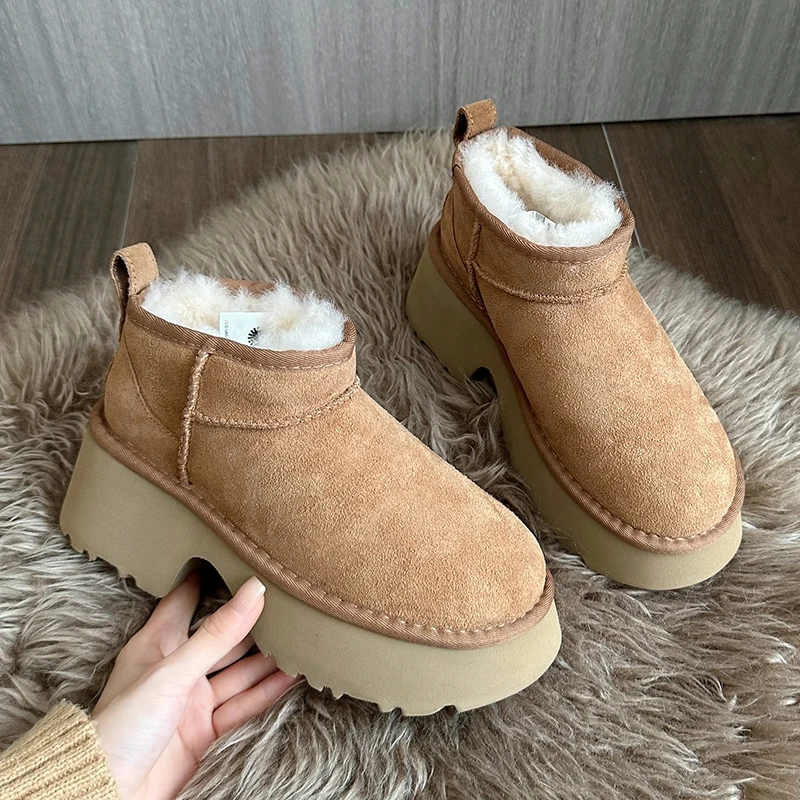 Зимние женские ботинки на толстом каблуке