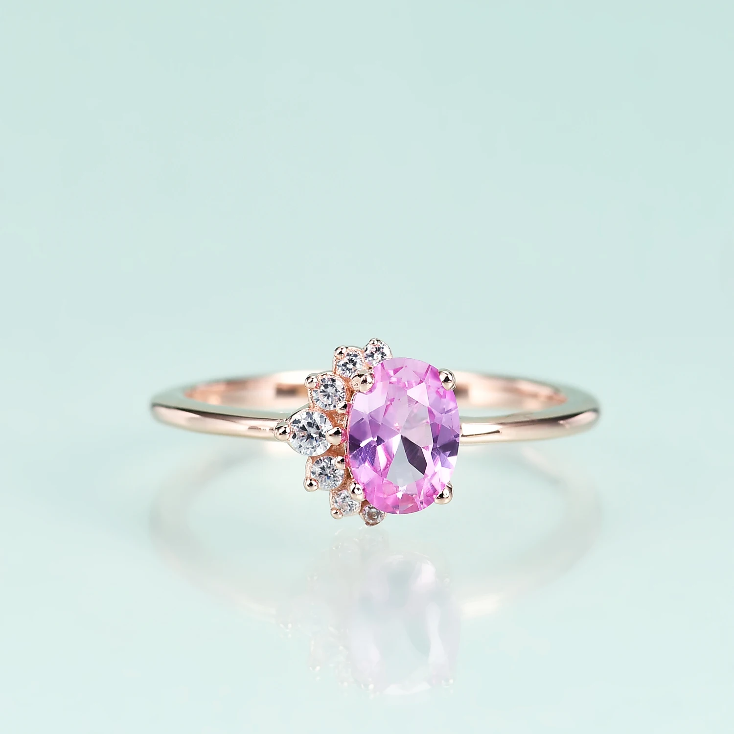 

Женское кольцо с розовым золотом и сапфиром, из серебра пробы
