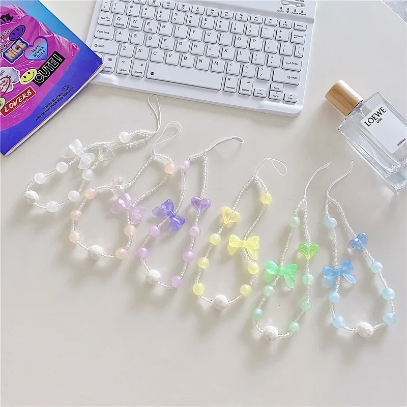 

Korean Fashion pop Small Fresh Love Heart bowknot Phone lanyard Rope diy Bracelet beads Chain Gril Cute Wrist Strap Key Pendant