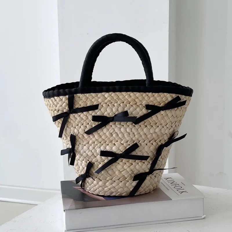 

Women's bag 2023 new bowknot straw bag i small fresh beach holiday handbag