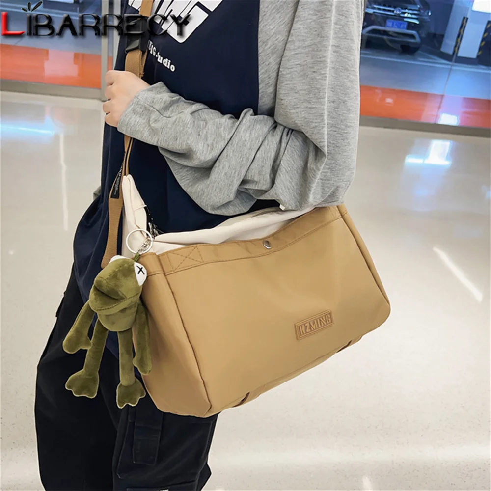 

Новинка 2023, дизайнерская качественная нейлоновая дамская сумка на плечо в стиле пэчворк, Весенняя модная женская сумка-мессенджер, Студенч...