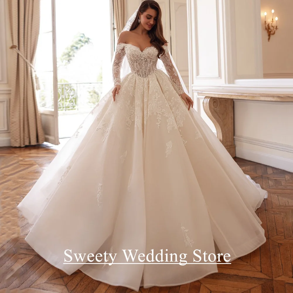 Фото Бальное платье из органзы, свадебное платье Vestido De Noiva, индивидуальное свадебное платье с длинными рукавами и v-образным вырезом, кружевной аппликацией, со шлейфом, арабское свадебное платье №1