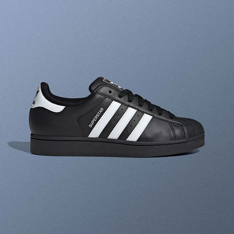 Фото Кроссовки Adidas JI0079 Icon Shell Toe, черно-белые, с тремя полосками, из премиальной кожи, с износостойкой резиновой подошвой, для повседневной ходьбы №2