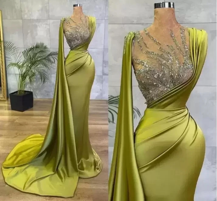

Green Prom Dresses Sleeveless V Neck Cape Sequins Celebrity Satin Mermaid Celebrity Appliques Evening Dresses Custom Made