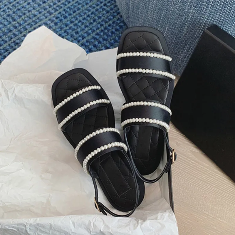 

Spring And Summer New Pearl One Word Strap Gladiator Sandals Women Open-Toe Back Strap Casual Flats Black Simple Women Shoes