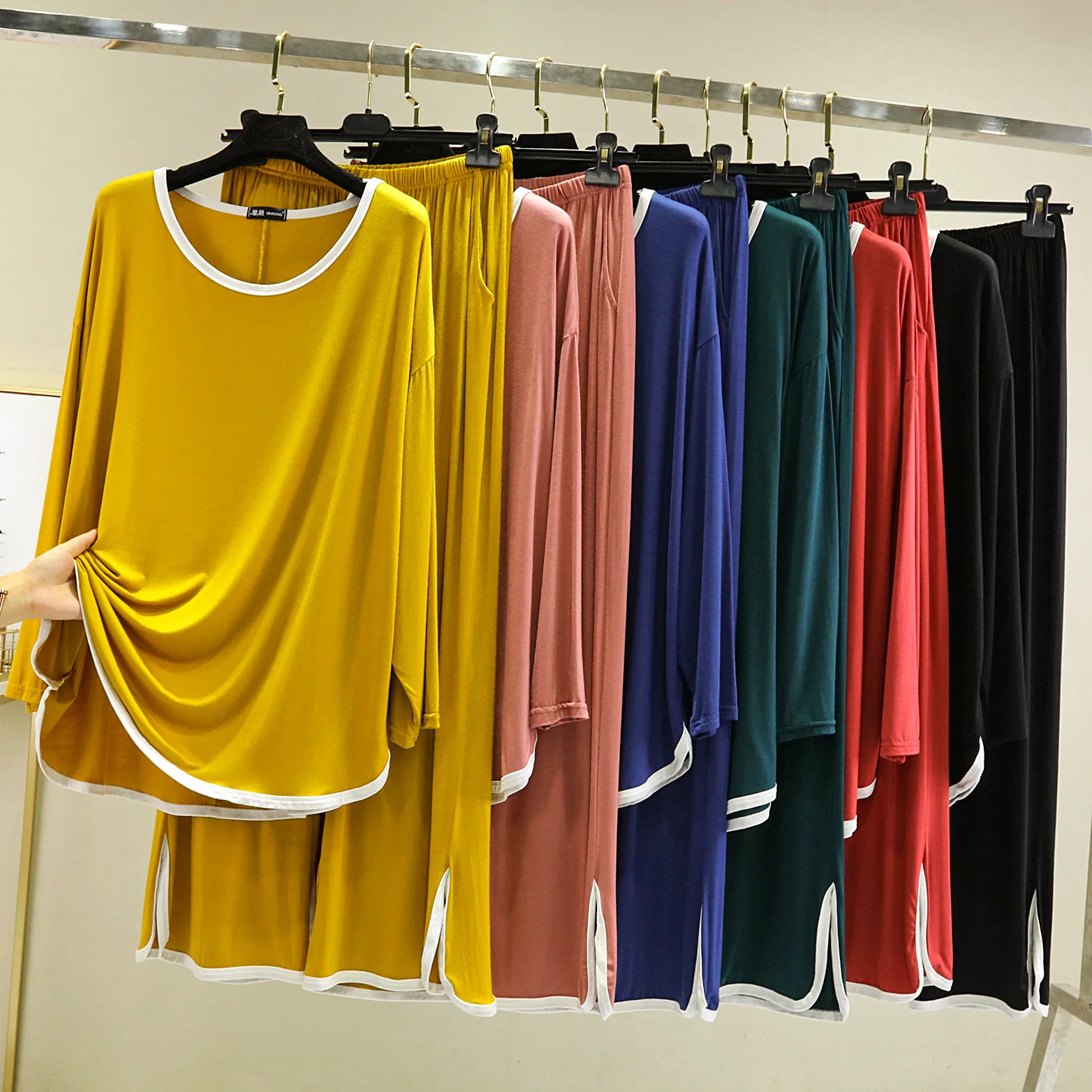 The new spring and autumn women's o-neck long sleeve T-shirt big pants open pocket matching individual householdwear comfortable