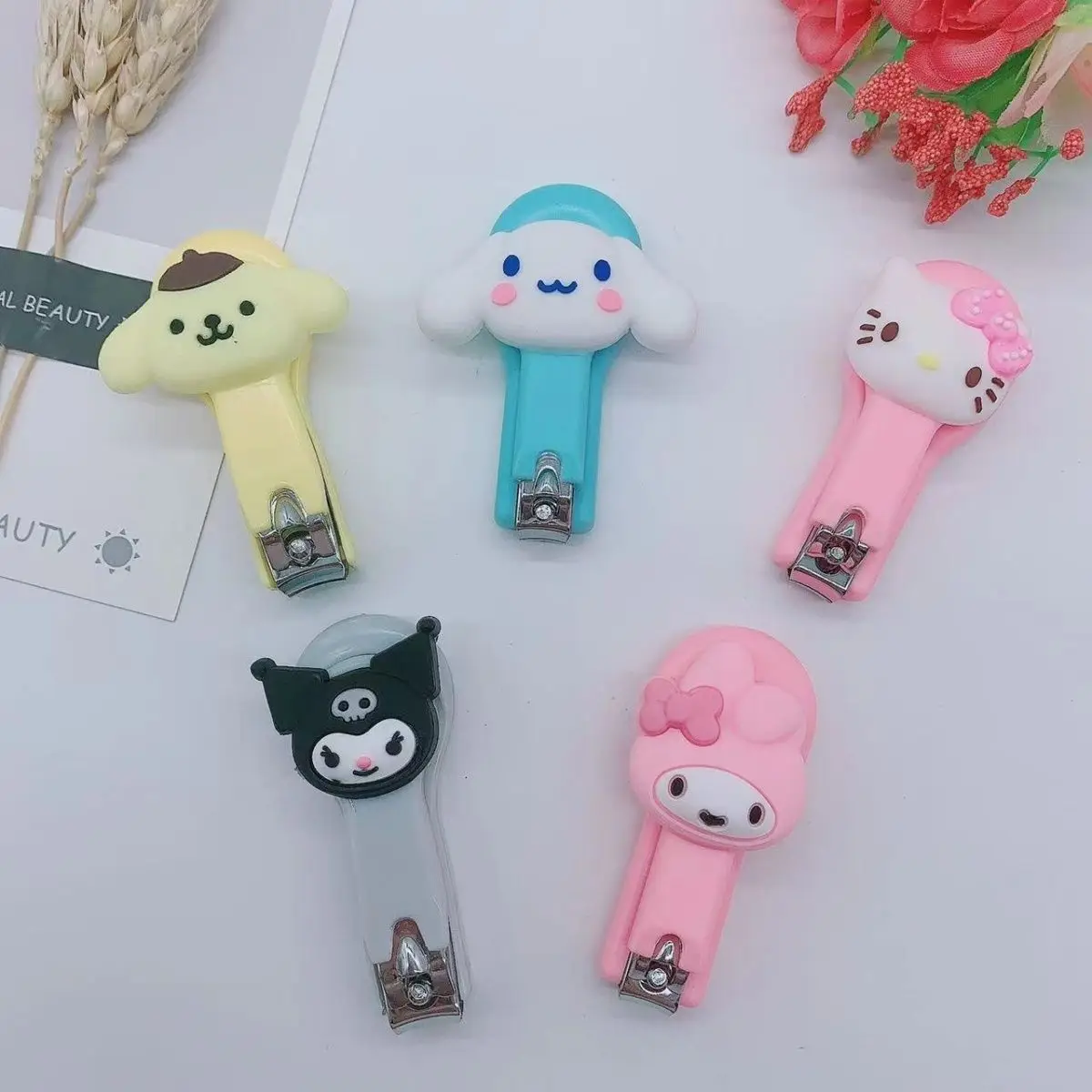 

Sanrio Hello Kitty Melody Cinnamoroll Kuromi Nail Scissors Cartoon Cute Portable Silicone Nail Scissors Articles for Daily Use
