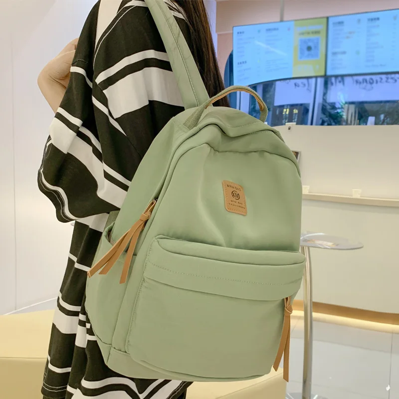 

Модный однотонный женский рюкзак, милая нейлоновая дорожная сумка в Корейском стиле, портативная школьная сумка для девушек, милый студенч...