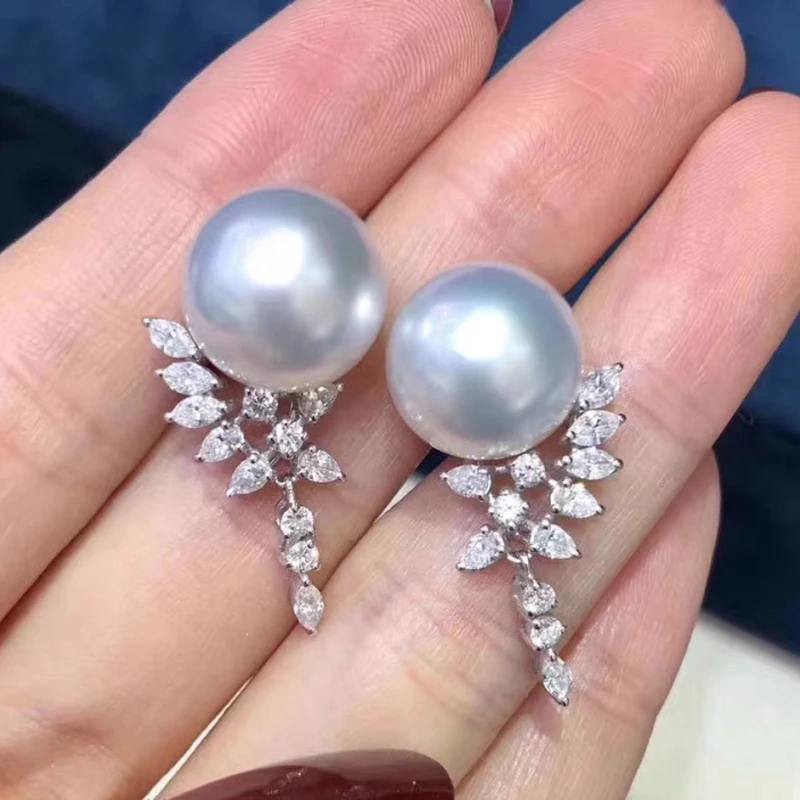 

Женские серьги-гвоздики из серебра 925 пробы с натуральным большим белым жемчугом 12 мм