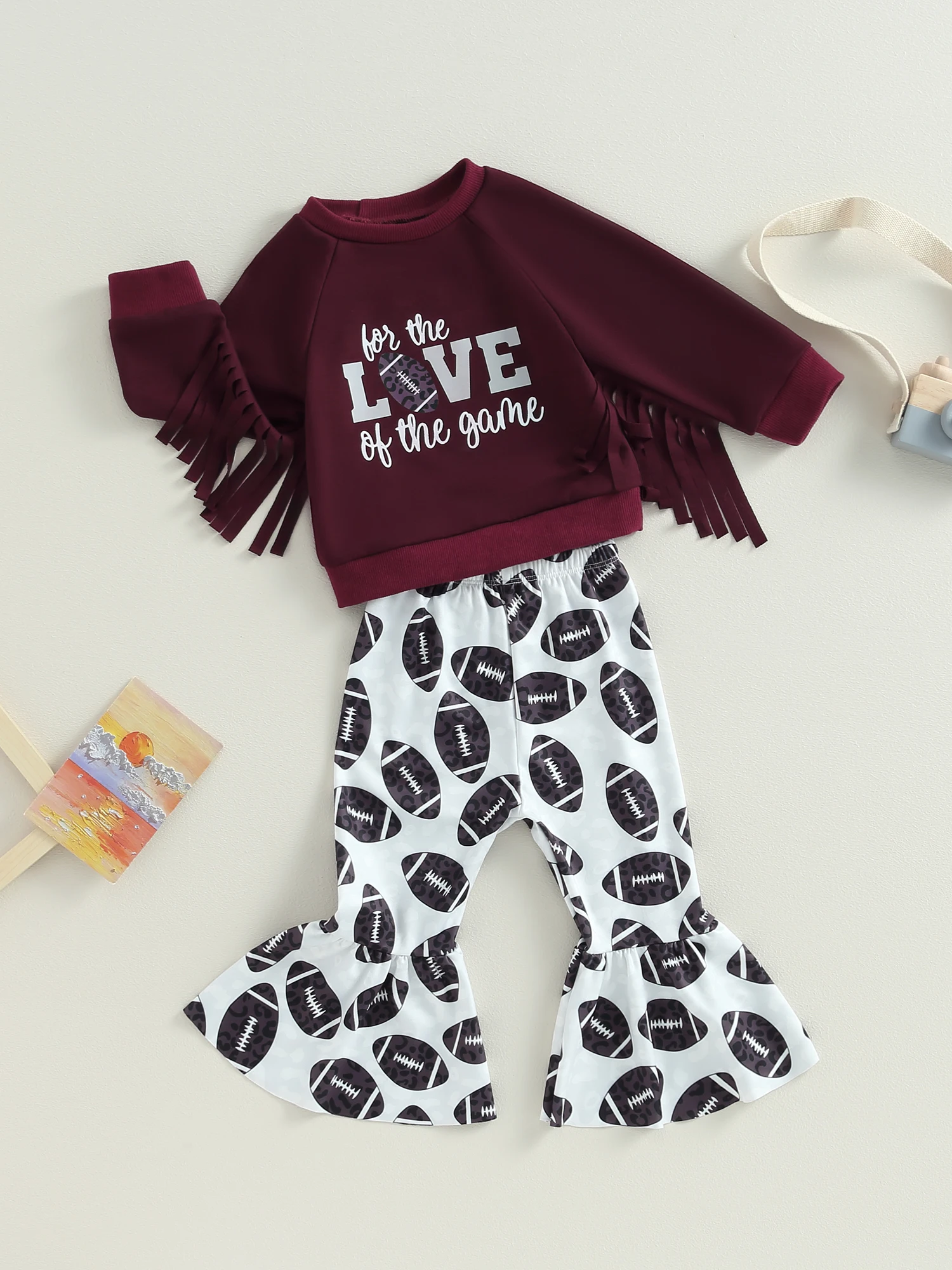 

JLKGICF Toddler Baby Girl Fall Winter Outfits Rugby Print Long Sleeve Sweatshirt with Tassels Rugby Printed Flare Pants Set