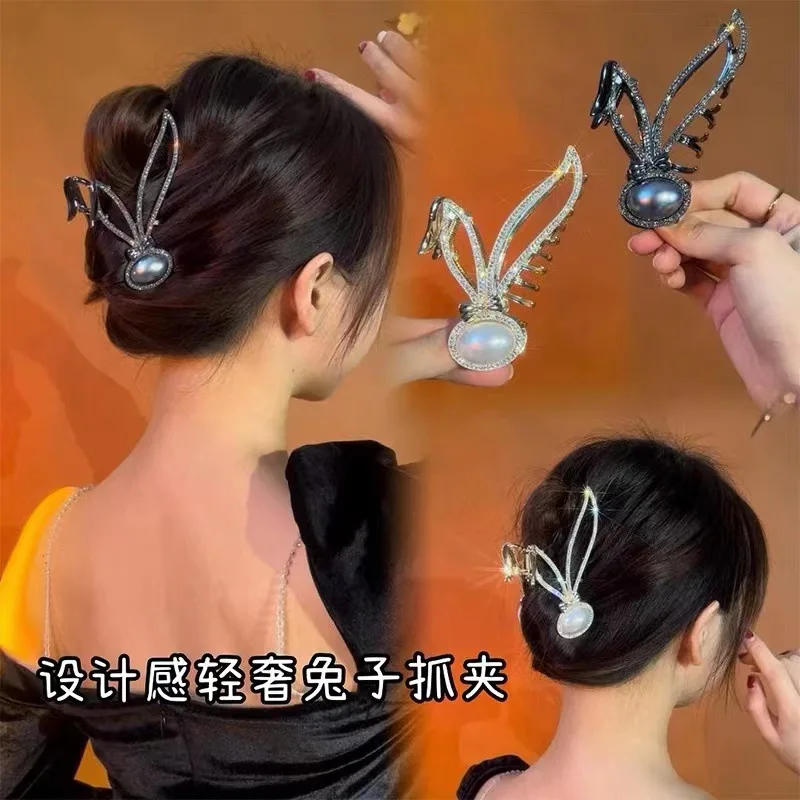 

New Year of the Rabbit Folded-ear rabbit hairpin design sense Back head spoon hair curling shark clip hair curling headdress