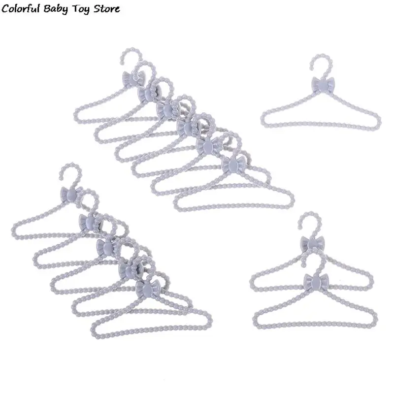 

20 PCS / Pack Gray Hangers Mini Cute Wardrobe Dress Coat Clothes Plastic Accessories For Doll Dollhouse Toy