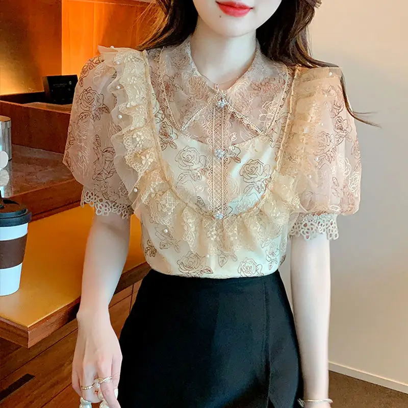 

Heavy worker beaded lace blouse top 2022 Summer lotus leaf shirt women's ocean bubble sleeve sleeve high -end small shirt female