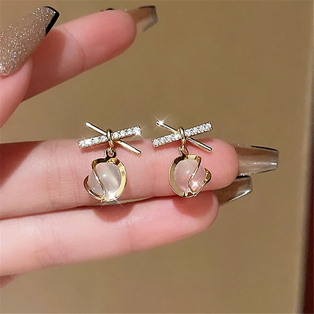 

2023 New Luxury Retro High-End Bow Zircon Earrings Female Ins Style Elegant Fashion Opal Earrings Net Red Ear Jewelry Wholesale