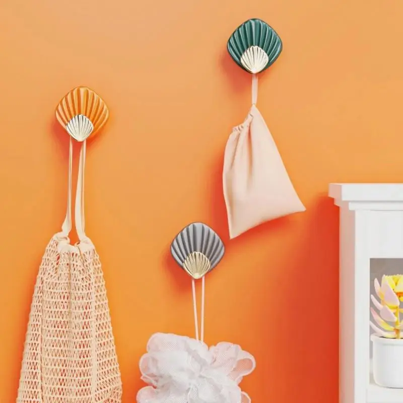 

4pcs New Shell Shape Punch-free Traceless Wall Hanging Hook Kitchen Self-adhesive Wall-mounted Sticky Hook Bathroom Organizer