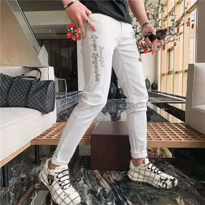 Джинсы мужские облегающие эластичные с вышивкой и надписью