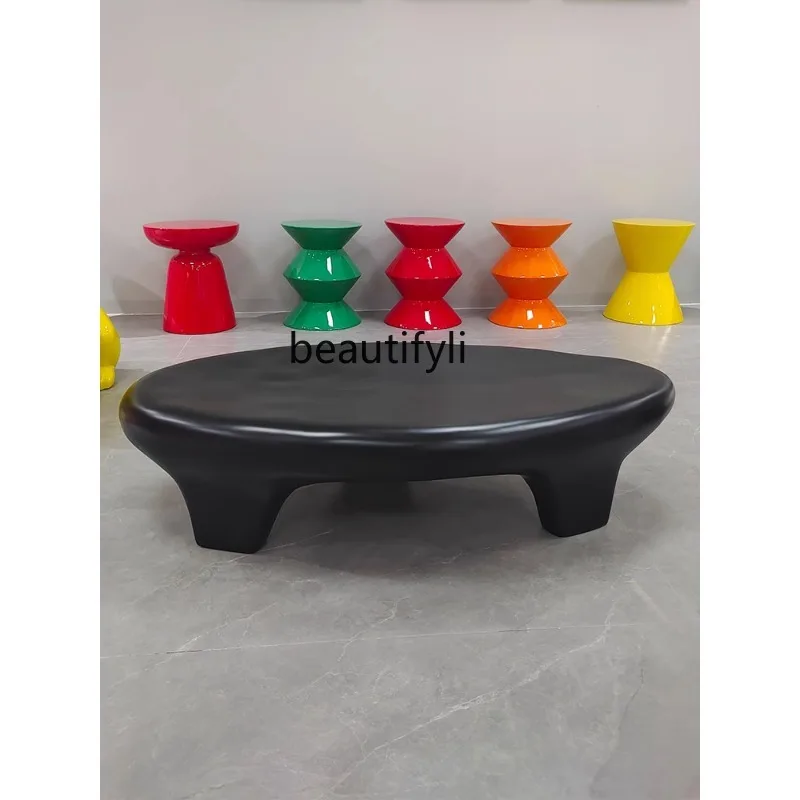 Кофейный столик в нордическом кремовом стиле из камня овальной формы