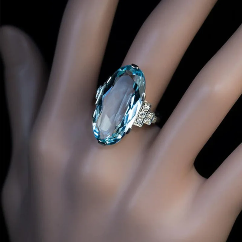 

New Trendy Silver Plated Oval Cut Sea Blue Crystal Rings For Women Shine CZ Stone Inlay Fashion Jewelry Wedding Party Gift Ring