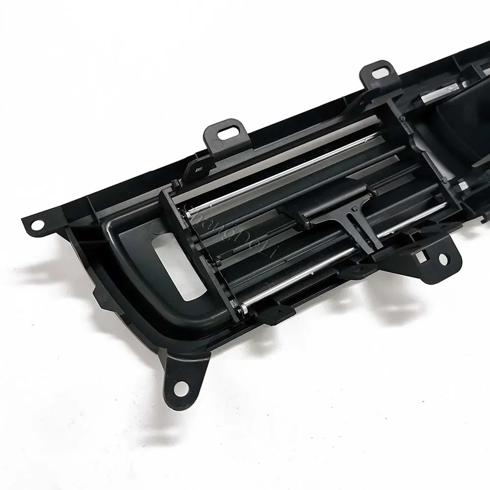 Передняя центральная вентиляционная решетка кондиционера автомобиля