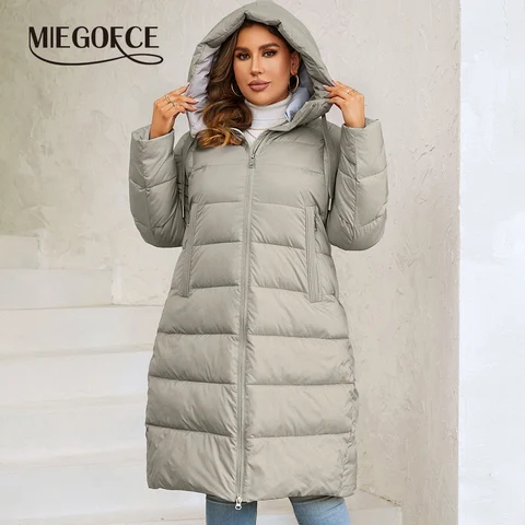 MIEGOFCE2024 Зимнее свободное женское длинное пальто большого размера с капюшоном, теплые ветрозащитные женские куртки, парка со стоячим воротником на молнии DM20680