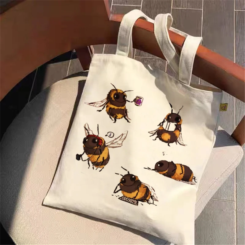 

2022 Girls Fashion Casual Cute Bee Print Canvas Tote Bag Shopping Bag Ladies Designer Handbag Large Capacity Shoulder Bag.