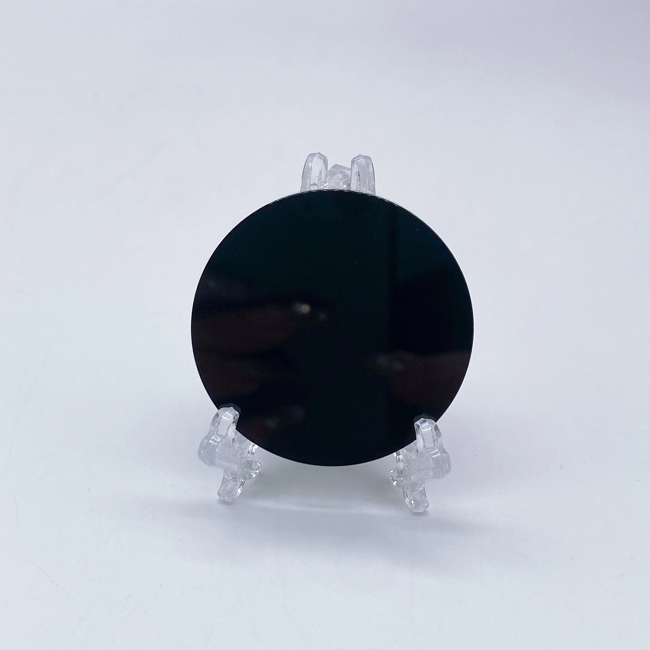 

Круглое зеркало из обсидиана 40-120 мм