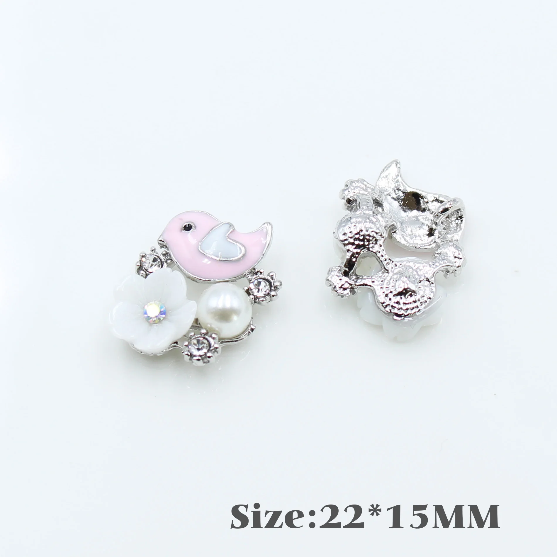 

New 22 * 15mm pink bird button hand sewn Diy hand button is used to decorate romantic wedding dress bow accessories