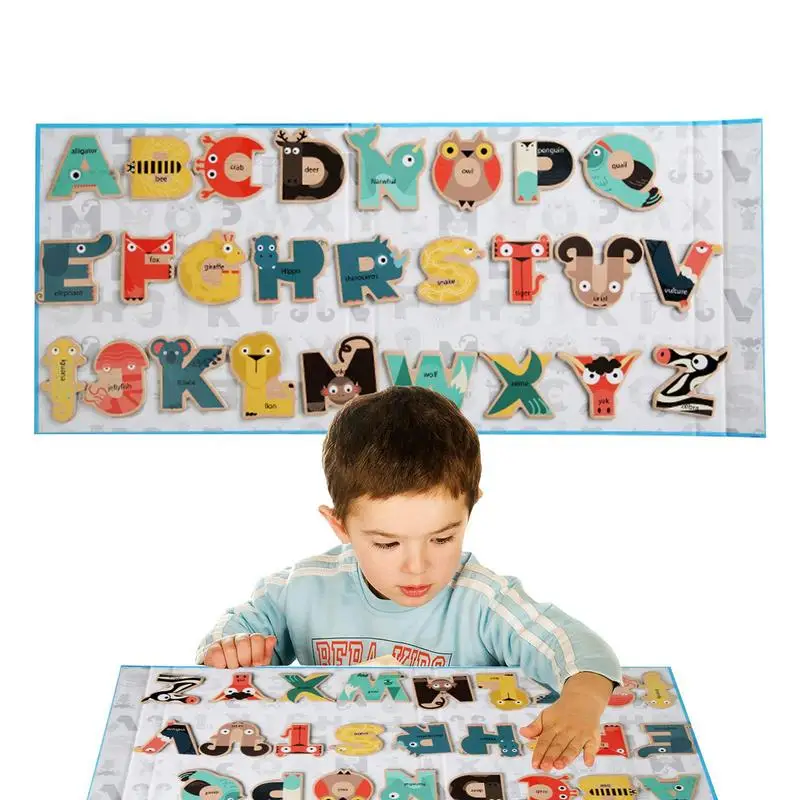 

Детская обучающая книга с магнитными буквами и мультяшным рисунком