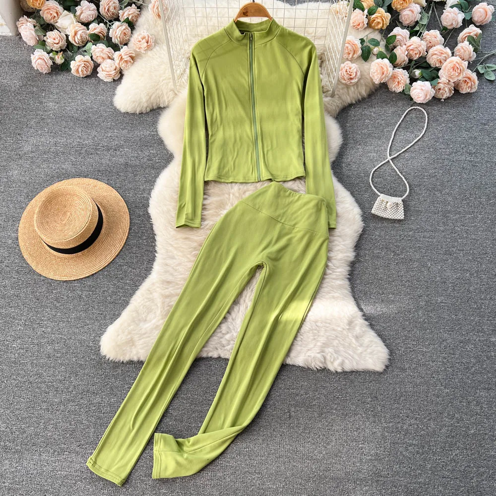 

Autumn Solid Color Sports Stand-up Collar Zipper Slim Long-sleeved Top + High-waisted Calf Pants Two-piece Set