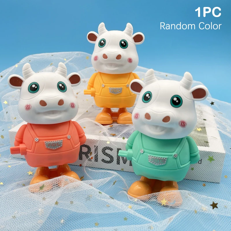 

1PC Cute Cows Clockwork Toys Cartoon Bouncing Toys Children Action Toy Kid Birthday Party Favors Gifts