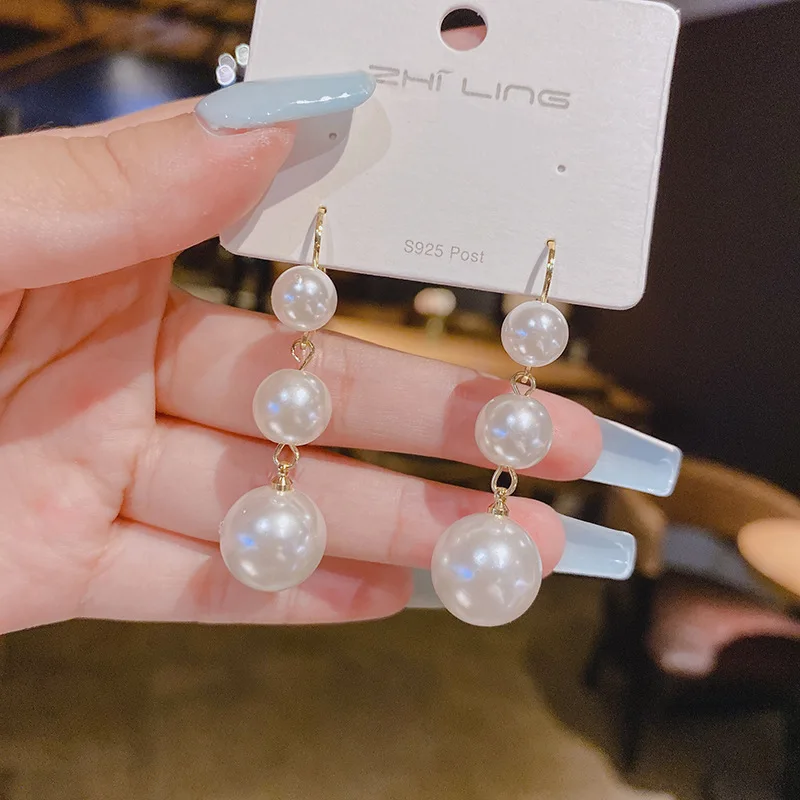 

Korean simple cool wind ins pendant ear jewelry Korean version big pearl temperament tassel earrings