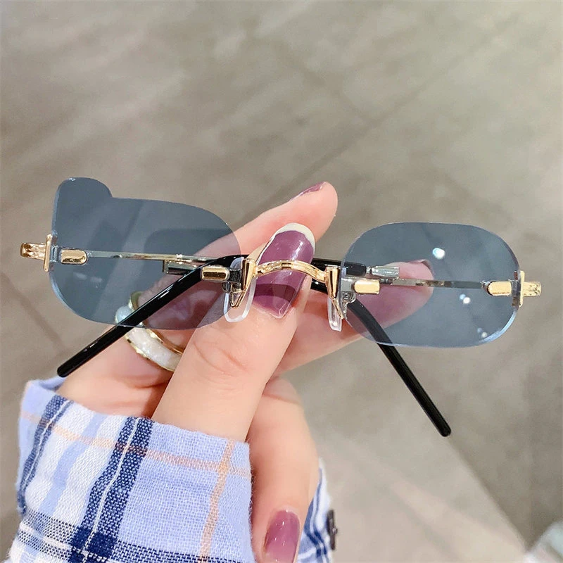 

Новинка 2022, маленькие Модные женские солнцезащитные очки без оправы, солнцезащитные очки в стиле ретро, синие мужские складные солнцезащит...