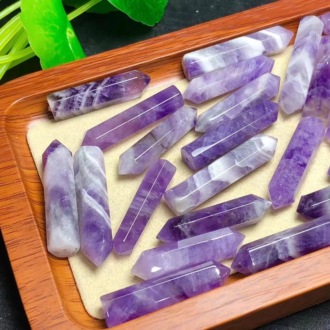 

Cross border hot selling 39mm natural crystal, natural stone, semi precious stone, natural fantasy purple pillar, hand carved de