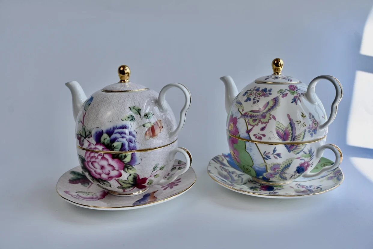 

Butterfly dance among flowers, one person enjoying tea set, three piece set, Bone China European style teapot cup and plate