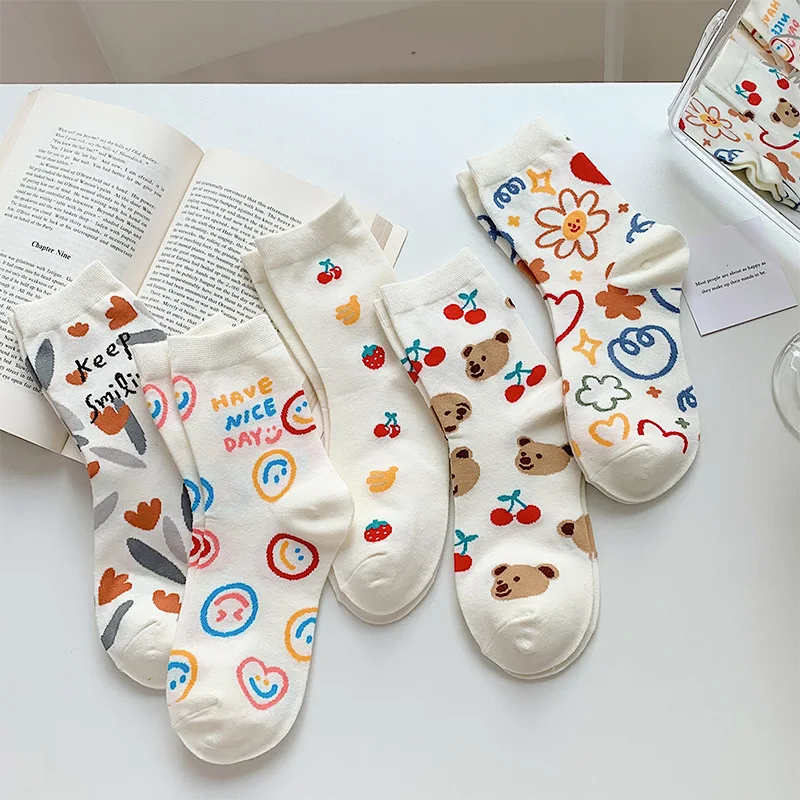 

Spring graffiti in tube socks women love smiling face bear flowers cream socks