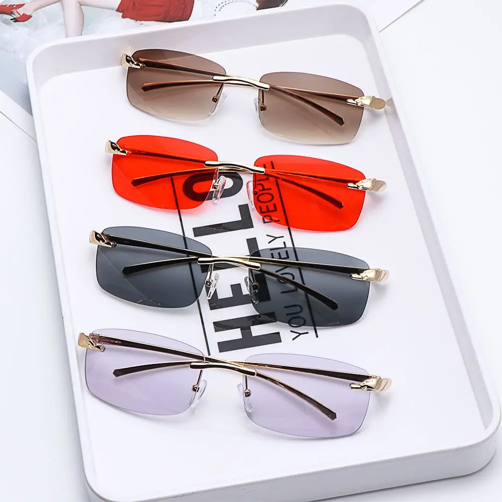 

Unique Metal Sun Glasses Small Frame Cheetah Rimless Clear Lens Sunglasses Rectangle Sunglasses Eyewear