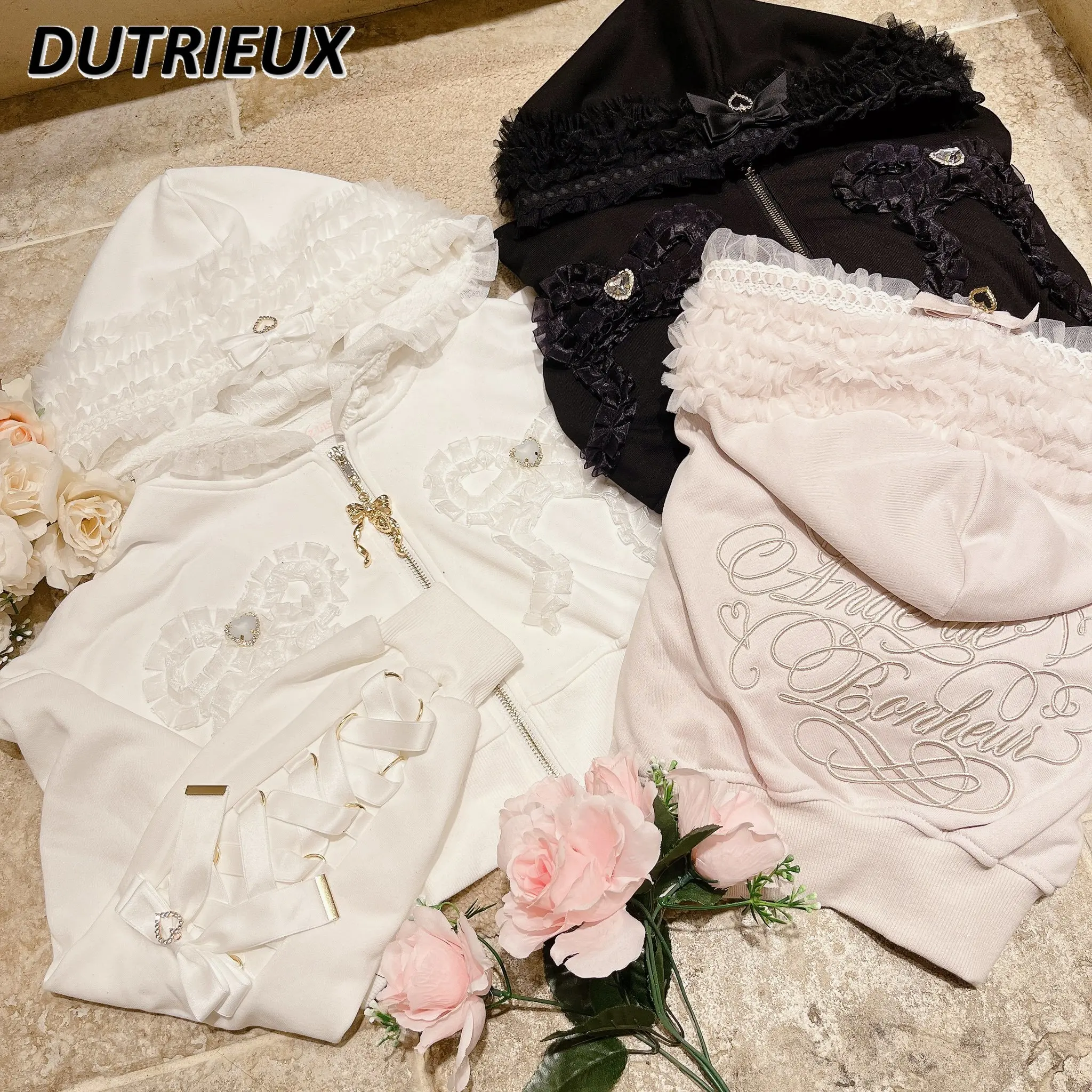 Женская толстовка со стразами и бантом