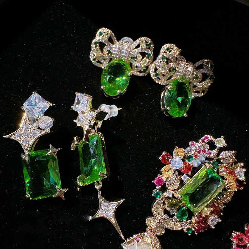 

2023 женская зеленая бабочка Mojito Duobao Jihua циркониевые серьги с жемчугом