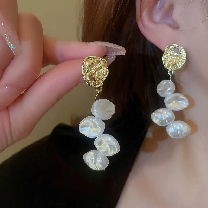 

Женские металлические серьги-гвоздики с кристаллами