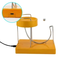 2022 new perpetual motion machine home decoration infinite jumping table toy kinetic art perpetual marble machine pendulum stand
