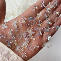100pcs nail art accessories aurora glitter 3d colorful butterfly bowtie skirt jewelry charms trendy resin diy nail tips decorati