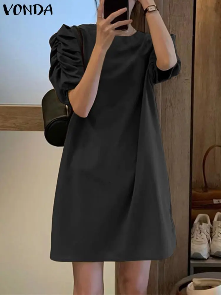 

Платье-мини свободного покроя с круглым вырезом и пышными рукавами