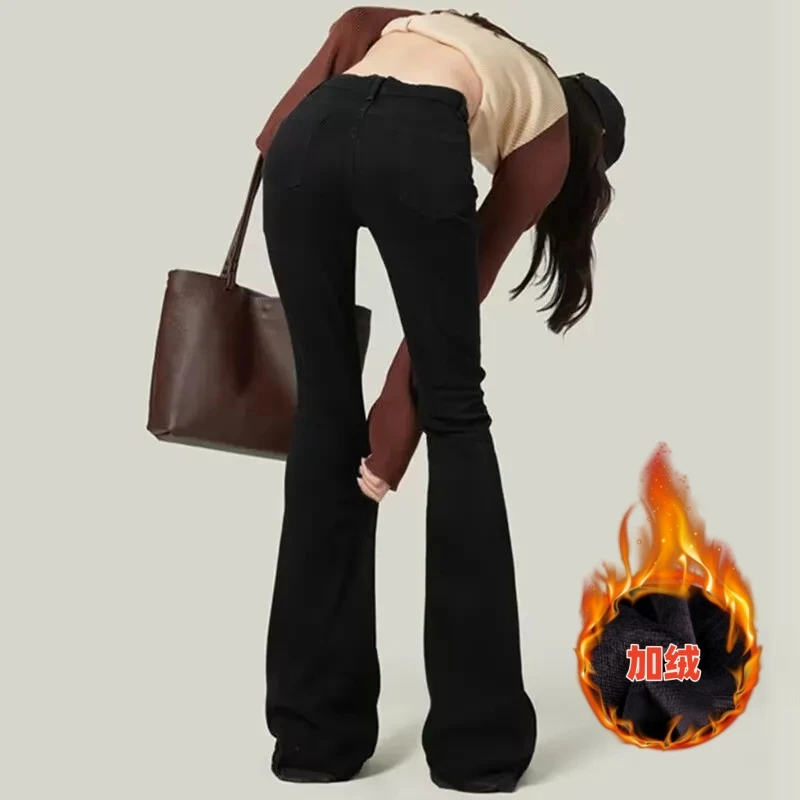 Зимние утепленные широкие джинсы на плюшевой подкладке женские теплые с высокой