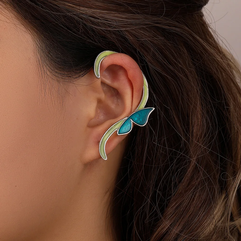 

Luminous butterfly earrings Simple fashion explosion over-the-top earrings retro everything matching personality studs