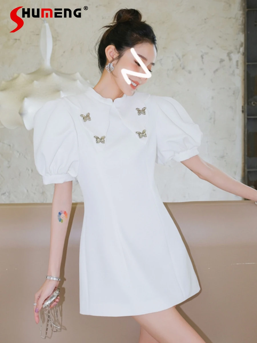 

French Entry Lux White Short Puff Sleeve Dress Women's High-Grade Elegant Metal Bow Niche Slimming Temperament Mid-length Dress